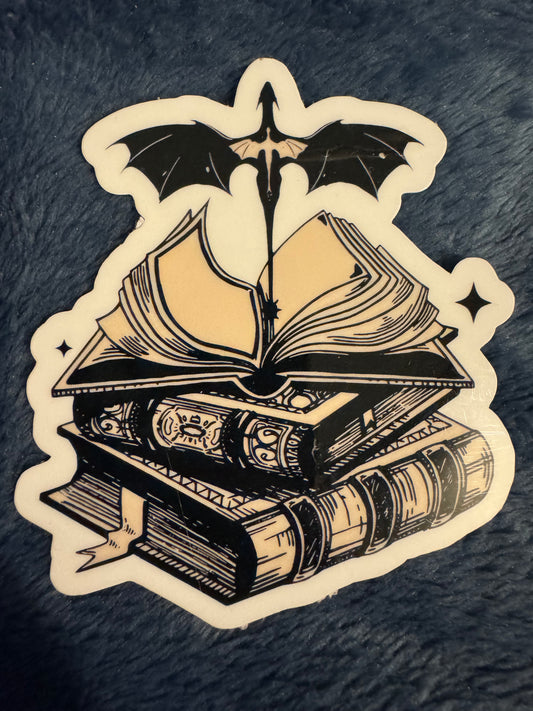 Books with dragon flying out sticker